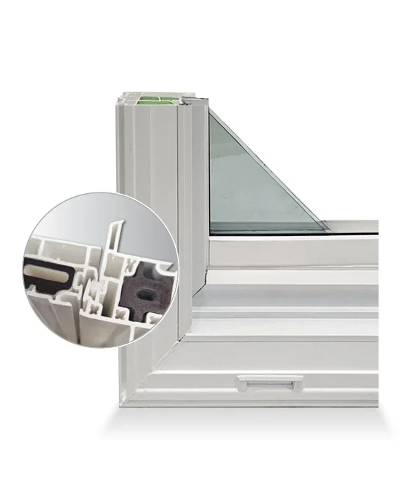 White vinyl window corner section shown at an angle, with a circular magnified inset revealing the multi-chambered frame profile, weatherstripping, and internal reinforcement.